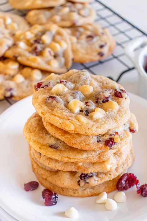 These White Chocolate Cranberry Cookies are sweet, buttery, and loaded with creamy white chocolate morsels and chewy dried cranberries. Easy and delicious, they're the perfect cookie for all your holiday festivities. Cranberry White Chocolate Cookies, Craisin Cookies, Christmas No Bake Treats, Chocolate Cranberry Cookies, White Chocolate Cranberry Cookies, The Perfect Cookie, Chocolate Cranberry, Best Christmas Cookie Recipe, Chocolate Biscuits