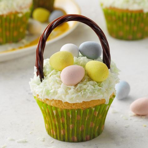 These cute cupcakes with their mild orange flavor are fun to dress up for Easter. As we raised four sons and a daughter, I prepared many, many school lunches and often added these springtime treats. —Julie Johnston, Shaunavon, Saskatchewan Basket Cupcakes, Easter Basket Cupcakes, Easter Cupcakes Easy, Traditional Easter Desserts, Easter Cupcake, Spring Cupcakes, Candy Egg, Spring Basket, About Easter