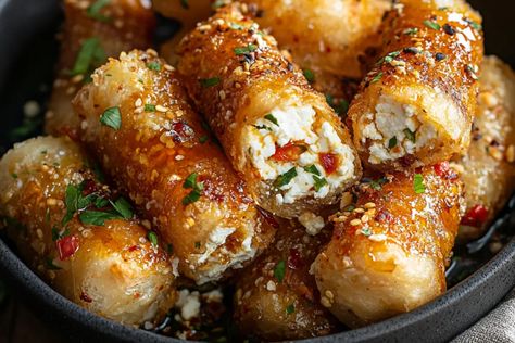 Oven Fried Feta Rolls with Chili Honey Feta Cheese Uses, Feta Rolls With Chili Honey, Fried Feta With Honey, Oven Fried Feta Rolls With Chili Honey, Savory Smores Cheese, Oven Fried Feta Rolls, Savoury Christmas Snacks, Fried Feta Rolls, Hungry Happens Recipes