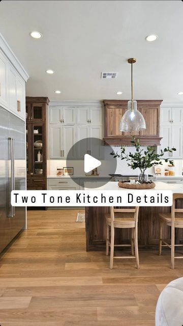 Aimee Lee Minnick on Instagram: "Ask and ye shall receive! 🙌🏻  Comment 'Love This Kitchen' for links to faucets, pendants, stools (and coordinating dining chairs) and, of course, the coveted cabinet hardware.   Here's all the other drool-worthy details:  • Faucet Finish: champagne bronze • Fridge: 72" wide • Island Length: 14' • Splash: Artesian Oyster Ceramic Tile from Floor & Decor  • Stained Wood Type: Walnut • Wall Color: November Rain by Ben Moore, mixed at 75% • Hardware Finish: Satin Brass • Flooring Type: White Oak Engineered Hardwood  • Flooring Info: Turbulance Muse in Eleanor (locals, hit up @pioneerfloorcoverings !) • Ceiling Height: 10'  I think I covered it all, but if not, just ask!  But can I just add, I'm STOKED y'all love this kitchen as much as I do! 🙌🏻  Designed by White Oak Floors Walnut Cabinets, Mushroom Kitchen Cabinets With Wood Island, White Oak Floors With Honey Oak Cabinets, Best Flooring For Kitchen With Ood Tone Cabinets, Luxury Vinyl Plank Flooring With Honey Oak Cabinets, Wood Kitchen Cabinets With Wood Floors, White Oak Stained Cabinets, Walnut And White Kitchen, White Oak And White Kitchen