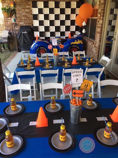 Hot wheels themed tablescape with flag backdrop two fondant covered cakes with cream cheese filling with a track passing thru the cake cake pops mini cupcakes and sugar cookies children decorated tables for a birthday party Car Themed Birthday Party, Hot Wheels Themed Birthday Party, Blaze Birthday Party, Auto Party, Blaze Birthday, Hotwheels Birthday Party, Hot Wheels Party, Hot Wheels Birthday, Car Birthday Theme