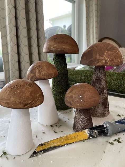 Have you noticed the mushroom home decor trend?Experts predict fungi will be huge in 2023! Get onboard, and let me show you how to make moss mushroom decor for your home!Alright, my friends, I’m going to be completely honest with you…I’m not a huge fan of mushrooms!If you would have told me last Spring I would be making moss mushrooms this year, I would have said you were out of your mind!!Just goes to show, you should never say never!!Everywhere I look, I see mushrooms! They are all o… Decorating With Mushrooms, Wooden Mushrooms Diy, Mushroom Decor Diy, Diy Mushroom Decor, Fairy Garden Ideas Enchanted Forest, Moss Mushroom, Mushroom Home Decor, Mushroom Home, Wooden Mushrooms