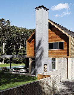 Art-Filled Hamptons Vacation Home - Photo 4 of 12 - Chimney Exterior, Gabled House, Paneling Walls, Superior Walls, Hamptons Vacation, Precast Concrete Panels, Chimney Design, Napa Style, Cedar Paneling