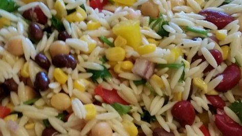 A Mexican-inspired cold pasta salad features orzo, chickpeas, black beans, cilantro, and lime juice for a refreshing, colorful meal. Mexican Orzo, Orzo Salad Recipes, Orzo Pasta Salad, Tomato Avocado, Orzo Recipes, Cold Pasta Salad, Orzo Salad, Cold Pasta, Refreshing Food