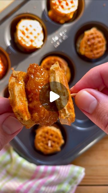 Shay Spence on Instagram: "spicy chicken and waffle sliders. (true life: i’m addicted to this little muffin tin)

SPICY CHICKEN AND WAFFLE SLIDERS
12 frozen chicken nuggets or popcorn chicken
1 1/2 tsp. cayenne pepper
4 Tbsp. butter, melted
2 Tbsp. maple syrup
2 tsp. hot sauce
24 mini frozen waffles

Preheat oven to 350F. In a 12-cup muffin tin, add one piece of chicken to each cup and bake in oven until crispy, 10-12 minutes. In a medium bowl, add cayenne, butter, maple syrup and hot sauce. Toss chicken in sauce while hot and set aside. 

Place one mini waffle in each cup of the muffin tin and transfer to oven until slightly toasted, about 5 minutes. Top with chicken then another mini waffle, securing with a toothpick. Brush the tops with any excess sauce from the chicken and bake until g Chicken And Waffles For A Crowd, Chicken And Waffles Appetizer, Chicken Waffle Bites, Chicken And Waffle Sliders, Shay Spence, Chicken Sandwich Sauce, Chicken Waffles Recipe, Chicken In Sauce, Waffle Sliders