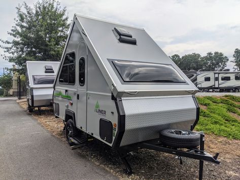 You may get lots of head turns with an A-frame camper, and for good reasons. They're cute, trendy, and efficient. So what is an A-frame RV? Let's find out! Are A-Frame Campers Any Good? See the 7 Best A-Frame Campers of 2021 #rvlife #rvliving #rvlifestyle #aframecamper #aframerv #aframepopupcamper Aliner Campers, A Frame Trailer, A Frame Camper, Lightweight Campers, Folding Campers, Rv Gear, Small Travel Trailers, Small Trailer, Tent Trailer