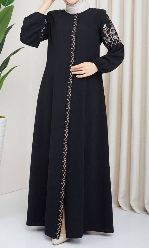 This beautiful Farasha style abaya has a plain inner maxi in fine jersey fabric with a chiffon embroidered loose outer layer and an embroidered matching belt for styling. Comes in standard size. Available in beige and black combination and black on black embroidery Black Abaya Embroidery Design, Abaya Embroidery Design, Beautiful Abaya Designs, Abaya Fashion Black, Zipper Abaya, Black On Black Embroidery, New Abaya Designs, Beautiful Abayas, Burqa Designs