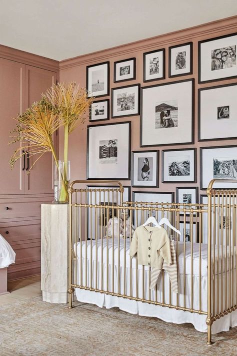 PHOTO: Shay Mitchell's Los Angeles home appears in Architectural Digest. Nursery Brass Crib, Brass Crib Nursery, Black White And Gold Nursery, Nursery Picture Wall, Brass Crib, Wall Of Paintings, Wall Of Pictures, Black And White Gallery Wall, Designer Nursery