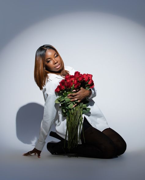 Red roses photoshoot idea white collared shirt black stockings black heels photoshoot White Rose Photoshoot, Rose Photoshoot Black Women, Rose Photo Shoot, Red Roses Photoshoot, Roses Photoshoot Black Women, Black Women Roses, Model With Roses Photoshoot, Black Women Roses Photoshoot, Roses Photoshoot