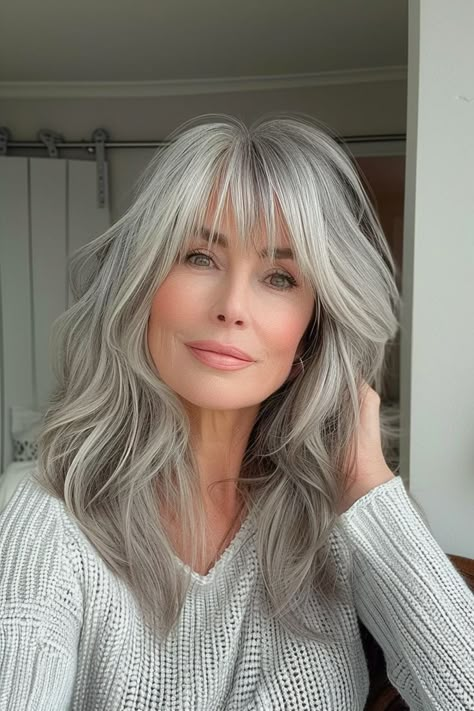 Discover the perfect hairstyle with these 20 long hairstyles ideas. Each look offers a fresh take on hair, blending style and practicality for a stunning appearance. Grey Hair With Bangs, Long Silver Hair, Sophisticated Hairstyles, Grey Hair Inspiration, Layered Haircuts For Medium Hair, Beautiful Gray Hair, Grey Hair Styles For Women, Silver Grey Hair, Long Gray Hair