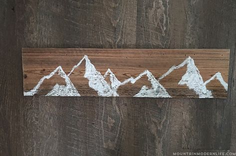 See how easy it is to create this mountain wall art using reclaimed wood. | MountainModernLife.com Mantle Art, Mountain Wall, Mountain Wall Art, Mountain Art, Mantle Decor, Woodworking Projects Diy, Diy Wood Projects, Handmade Home Decor, Rustic Diy