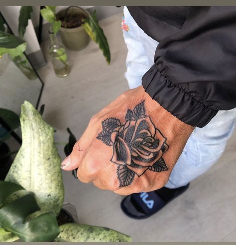 Mens Rose Arm Tattoo, Men’s Flower Hand Tattoo, Small Hand Tattoos For Guys Ideas, Hand Wrist Tattoo Men, Flower Hand Tattoo Men, Hand Rose Tattoo Men, Rose Tattoo Men Hand, Men S Hand Tattoo, Small Rose Hand Tattoo