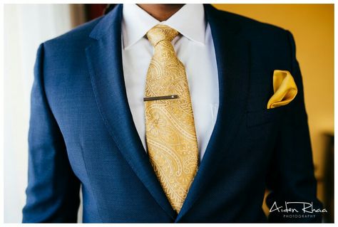 Navy suit & gold tie Navy Suit Gold Tie Wedding, Navy Blue Suit With Gold Tie, Blue And Gold Tuxedo Wedding, Navy Suit With Gold Tie, Navy Blue And Gold Tuxedo Wedding, Tie With Navy Blue Suit, Navy Suit Gold Tie, Navy And Gold Groomsmen, Navy And Gold Suit