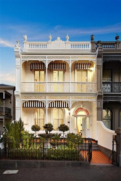 123 Gipps Street, an elegant William Pitt-designed c1887 4-bedroom Victorian Italianate terrace situated in patrician East Melbourne, is back on the market once again. We’re not sure what it is about... Terrace House Exterior, Victorian Terrace House, Heritage House, French Colonial, Australian Architecture, Victorian Terrace, Iron Fence, Victorian House, Up House