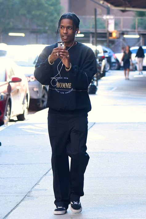 He's not a skater, but he sure does look like one. Reaffirming that baggy trousers are the way forward, Rocky looks like he's come straight from Venice Beach skate park. What we're saying is, Rocky can easily morph himself into any [link url="http://www.gq-magazine.co.uk/gallery/mens-style-tribes"]style tribe[/link] and look the part. Hommes Grunge, Asap Rocky Outfits, Looks Hip Hop, Pretty Flacko, Style Outfits Men, Streetwear Fits, Men Street Fashion, Streetwear Mode, Street Style Outfits Men