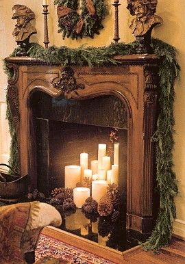 Looking for something to do when an actual fire isn't appropriate.   Tassels Twigs and Tastebuds Christmas Fireplaces, Christmas Fireplace Mantels, Mantle Decorations, Fireplace Diy, Fresh Garlands, Fireplace Mantles, Fake Fireplace, Candles In Fireplace, Fireplace Mantel Decor