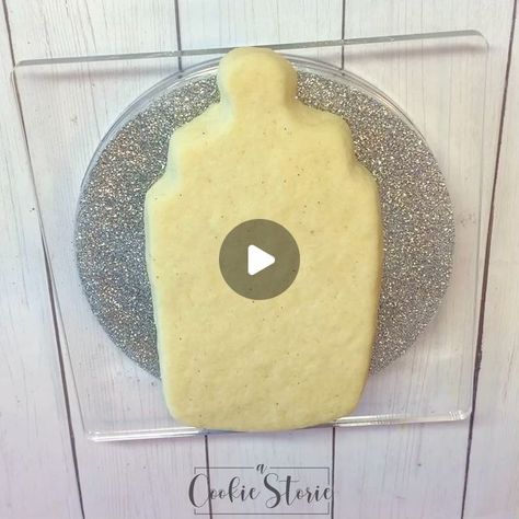 A Cookie Storie on Instagram: "Happy Saturday 🙃 Cookie cutter is from @annclarkcookiecutters. Icing squiggles are to prevent the icing from cratering. Icing tips used were Ateco 136, @wiltoncakes 18 & 16. & cookie turntable is from @thesweetesttiers. • • • • • #sugarcookies #customsugarcookies #decoratedcookies #decoratedsugarcookies #acookiestorie #cookiedecorating #royalicing #royalicingcookies #royalicingart #instacookies #bakersspotlight #talentedcookiers #cookiesofinstagram #cookiegram #cookieinspo #cookiedecorator #cookieoftheday #cookievideo #cookiedecoratingvideo #cookietutorial #babyshowercookies #babybottlecookies" Baby Bottle Cookies Decorated, Oh Boy Cookies, Gift Cookies Decorated, Cookie Turntable, Baby Shower Royal Icing Cookies, Cookie Decorating Videos, Baby Bottle Cookies, Cookie Gram, Happy Birthday Cookie