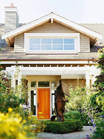 With a spacious and airy entry that opens to the second floor, this gabled dormer window lets light pour down the foyer. This once-dark space, now one of the home's brightest spots, serves as a warm and welcoming spot for visitors upon arrival. Craftmans Style House Exterior, Craftsman Curb Appeal, Craftsman Exteriors, Craftsman Houses, Bungalow Ideas, Small Bungalow, Craftsman Homes, Cozy Cottages, Shed Dormer