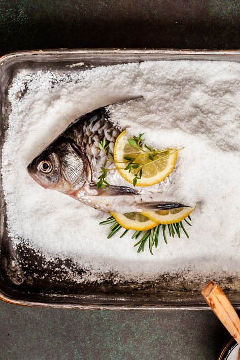 There are few things more impressive than preparing a whole fish, but crust that fish in salt and crack it open at the dinner table - and you've got serious wow factor. Level up your entertaining with this fabulous class. Salt baking creates an insulation that allows the fish to gently steam in its own juices which results in a perfectly flavourful and seasoned fish. #turkishfood #seafoodlover #summerdinnerparty #transportyourkitchen Salt Crusted Fish, Salt Fish, Salt Baked Fish, Fish Food Photography, World Chef, Flavored Olive Oil, Mediterranean Salad, Dinner Party Summer, Gift Card Number