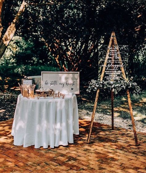 "This beautiful, handcrafted rustic wood easel is the perfect way to display your wedding sign, art piece or large photo. The adjustable shelf can accommodate a large range of sizes and heights. The support leg is attached via a hinge and swings to and away from the front two legs to minimize its footprint and only occupy the necessary space. Nothing flimsy about this easel. Built to withstand outside wind-- it won't be easily knocked over! Felt foot pads attached to the bottom of each leg make is perfectly suited for indoor use as well. No need to worry about scuff marks on the floor. Some assembly is required upon arrival, but it is minimal. Assembly instructions are provided and only tool required is a Phillips-head screwdriver. SPECIFICATIONS:  60\" Floor Easel Approximately 60\" tall Floor Easel, Wood Easel, Rustic Wedding Signs, Art Easel, Event Signage, Event Stand, Art Stand, Inexpensive Wedding Venues, Large Sign