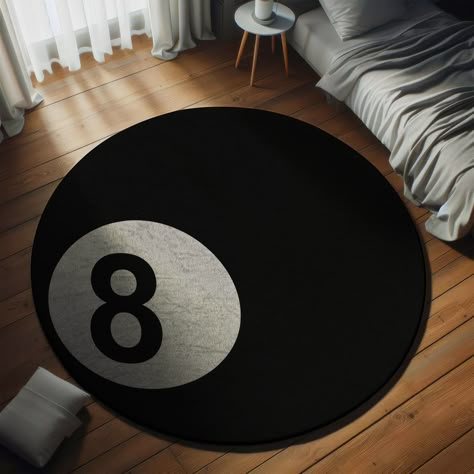 Make a Bold Statement with Our Exclusive 8 Ball Rug Transform any room into a space of intrigue and style with our 8 Ball Rug. Perfectly round, featuring the iconic 8-ball design, this rug is a must-have for anyone looking to add a touch of cool, contemporary flair to their home. Whether you're decking out a game room, adding personality to your living space, or gifting something unique, our 8 Ball Rug is sure to impress. Why Our 8 Ball Rug? Striking Design: With its bold 8-ball imagery and deep 8ball Room Decor, Streetwear Room Ideas, 8ball Rug, Cool Carpets, 8 Ball Rug, Cool Rug, Uni Room, Cosy Room, Dreams Beds