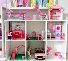 Kallax Barbie House, Kallax Styling, Elsa's Dresses, Doll House Barbie, Barbie Storage, Barbie Organization, Toy Room Storage, House Barbie, Diy Barbie House