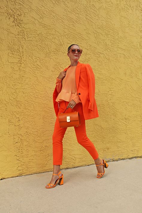 Blair Eadie reveals her top 10 picks from J.Crew's new arrivals section. See them all on Atlantic-Pacific! Amur Dress, Mode Monochrome, Neon Pants, Orange Suit, Blair Eadie, Atlantic Pacific, Shoes Walking, Orange Outfit, Blouson Sleeve