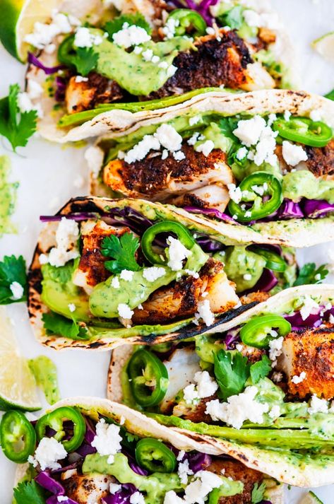 Blackened Cod Fish Tacos with Cilantro Avocado Sauce - The perfect seafood and Mexican fusion weeknight dinner done in less than 30 minutes! #blackened #cod #fish #tacos #cilantro #avocado #sauce #dressing #coleslaw #healthy #dinner #recipe #weeknight #Mexican #seafood Cilantro Avocado Sauce, Cod Tacos, Blackened Cod, Cod Fish Tacos, Mexican Fusion, Fish Tacos Recipe, Avocado Sauce, Healthy Summer Dinners, Cod Recipes