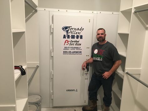 Here's a great example of what can be done with a walk in closet. This 5 adult Defender safe room fits neatly at the end of the closet leaving room for hanging clothes and shelves. Give us a call to find out what we can do for you at Tornado Alley Armor. Toll free 855-55-ARMOR. Hidden Storm Shelter Safe Room, Closet Storm Shelter, Walk In Safe Room, Tornado Room In House, Safe Room In Closet, Diy Panic Room, How To Build A Safe Room In Your House, Tornado Safe Room In House, Safe Room Ideas Master Closet