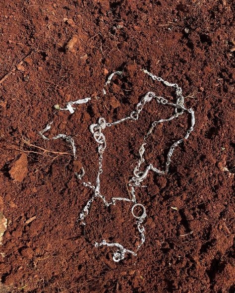 Bespoke chains waiting to oxidize in red dirt from my grandma’s garden. Red earths can be caused by a high natural iron accumulation that has been oxidized by both the surrounding air and moisture to cause a reddish color. The iron in the soil continually oxidizes as the earth continues to rust, gracefully including my chains in this earthly process as long as they remain buried. Earth soaked chains available with my next website update as well Red Rising, Red Dirt, The Soil, The Earth, Soil, Bespoke, Rust, Moisturizer, Canning