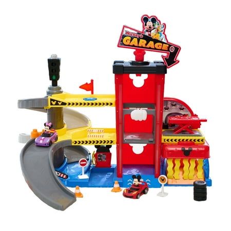 The Disney Junior Mickey Mouse Ready to Race Garage has everything a kid needs for tune ups, repairs, and lots of fast-paced fun. This 18.5-inch-tall playset comes with 18 pieces including Mickey Mouse and Minnie Mouse toy vehicles, a 3-story garage, 6 track pieces, a gas pump, 2 traffic cones, a barricade, a barrel, a stack of tires, and 3 signs. The garage features lights, sounds, a working elevator, a spiral ramp, a mechanics station, and a car wash. Kids will have fun filling the car wash wi Spiral Ramp, Hot Wheels Track Builder, Disney Junior Mickey Mouse, Mickey Mouse Toys, Minnie Mouse Toys, Mickey Mouse And Minnie Mouse, Hot Wheels Track, Ready To Race, Mouse Color