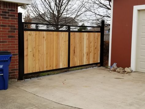 Son and I built this double gate using 2 inch square 14 gauge tubing for the framework of the gates. The posts are made from 4 inch square 14 gauge tubing. The 2 posts are connected with a crossbar of the same size material. Thus creating an "H" style unit so that way the post are square up to each other. Some larger gates units use a header bar that goes overhead.  This particular one we chose to run a crossmember that would run flush with the edge of the concrete. Cedar Gate, Driveway Fence, Wooden Fence Gate, Wood Fence Gates, Brick Accent Walls, Huge Design, Brick Pathway, Security Gates, Gabion Wall