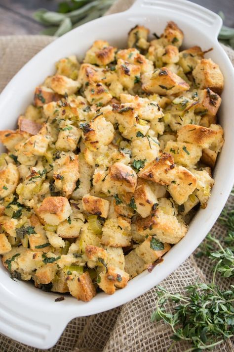 You will love making Homemade Herb Sourdough Stuffing. Fresh ingredients and full of flavor makes this recipe delish, right next to Grandma's recipe. Made with Sourdough bread cubes, fresh herbs, and sauteed vegetables it's a fun recipe for the holidays. Create memories with your Thanksgiving meal. #devourdinner #devourpower #thanksgiving #holiday #stuffing #sourdoughstuffing #foodblogfeed #foodstagram #foodphotography #buzzfeedfood #feedfeed #foodcoma #foodgawker #foodblog #forkyeah #eeeeats Sour Dough Stuffing Recipe, Sourdough Stuffing Thanksgiving, Sourdough Stuffing Recipes, Smoked Turkey Sides, Easter Stuffing Recipe, Fall Sourdough, Sourdough Stuffing Recipe, Turkey Sides, Sourdough Stuffing