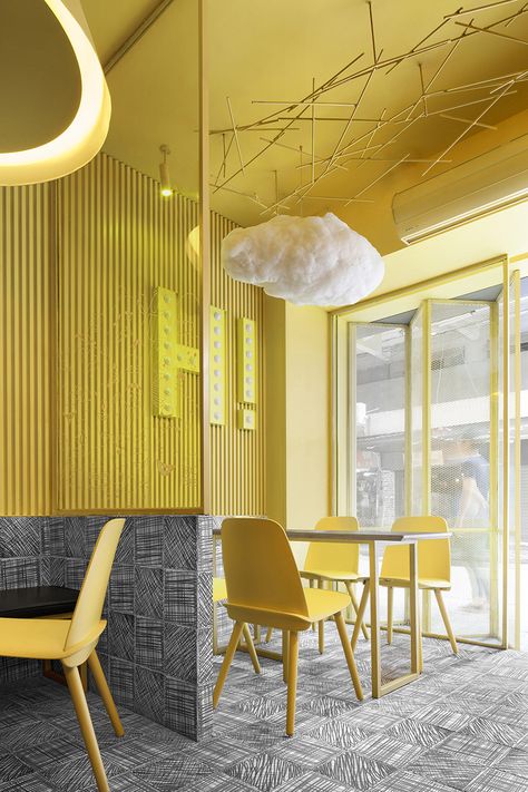 construction union has designed an eye-catching interior for the hi-pop tea restaurant in china, defined by nostalgia inducing scribbles. Tour Website, Peter Dunham, Diner Restaurant, Design Café, Room Decor Living Room, Yellow Room, Coffee Shops Interior, Yellow Interior, Coffee Shop Design