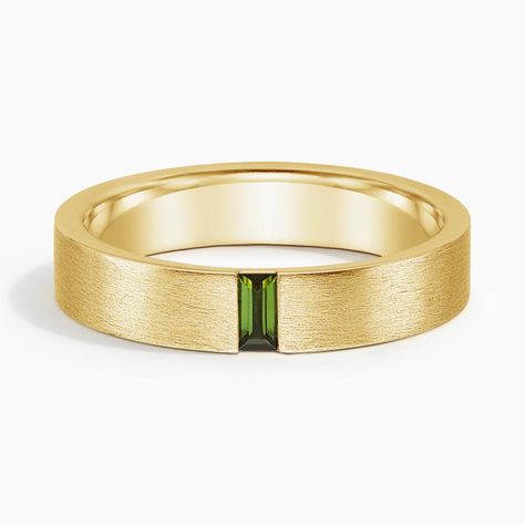 Men's 18K Yellow Gold Apollo Green Tourmaline 4.5mm Wedding Ring. This modern wedding band features a vertical baguette green tourmaline set in a matte brushed finish for a defining look. The softened inside edge provides increased comfort for daily wear. Mens Vintage Wedding Ring, Men’s Wedding Bands With Stones, Engagement Rings Guys, Peridot Ring Men, Gold Engagement Ring Silver Wedding Band, Men’s Wedding Band With Emerald, Mens Wedding Bands Simple, Marriage Ring Men, Mens Peridot Ring