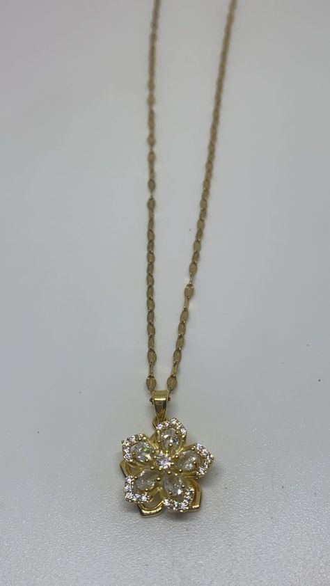 Rotating Flower Necklace Material: Stainless Gold Color: Gold and Clear flower charm Gender: Women Type: Necklace Style: Trendy l Osuna’s Jewelry