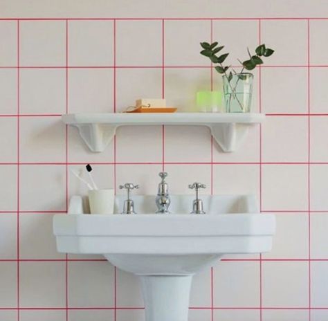 Looking for a way to seriously make your bathroom or kitchen stand out? Try working colored grout into the mix. Pink Grout, Colour Grout, Square Tile Bathroom, Colored Grout, White Square Tiles, Bathroom Grout, Cat Urine Remover, Colourful Bathroom, Beautiful Tiles