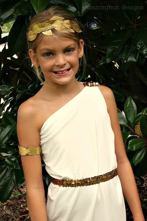 This year if you are unsure about what to dress your child up as, try these 23 Easy Halloween Costumes for Kids that are unique, fun, popular, and some that are really affordable to do. Greek Goddess Costume Diy, Goddess Costume Diy, Greece Costume, Athena Costume, Goddess Halloween, Toga Costume, Handmade Halloween Costumes, Roman Costume, Greek Costume