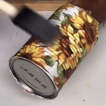 This is a guide to making a DIY tin can candle holder. Learn how to make a pretty sunflower candle holder out of repurposed tin cans, in this step-by-step Hometalk tutorial. Decoupage On Tin Cans, Tin Can Candles, Repurpose Candle Holders, Tin Can Candle Holders, Rustic Candle Holders Diy, Tin Can Centerpieces, Repurposed Candle Holders, Candle Reuse, Can Candles