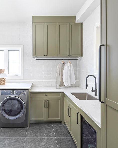 A laundry room that combines style with functionality. The perfect blend of sage green cabinetry and sleek countertops. Designed to elevate your everyday with both beauty and practicality. 🧺 ✧ (519)-415-5555 ✧ info@steddystyles.com ✧ 685 Riddell Rd, Unit 104, Orangeville ✧ Call us to book a consultation! #InteriorDesign #HomeRenovation #NewBuild #HomeDesign #3DRenderings #BeautifulHomes #SpaceTransformation #SteddyStyles #DufferinCounty #InteriorInspiration #LaundryRoomDesign#GreenCabinetr... Green And Wood Laundry Room, Sage Laundry Room, Sage Laundry, Wood Laundry Room, Living Room Built Ins, Laundry Room Design, The Duff, Built Ins, New Builds