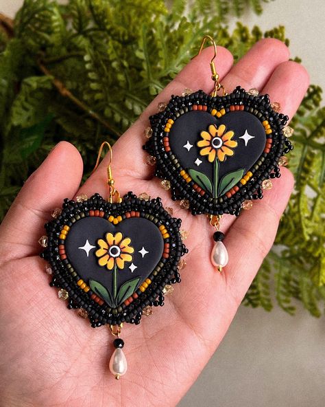 American Traditional Beaded Earrings 🧡🌿 Available TOMORROW at 5pm PDT! ✨ Don’t forget to join my broadcast channel or sign up for my newsletter over on my site for updates and discounts on my collections! I love how these turned out! 🥹 I have a similar pair that I’ll have finished tomorrow for my shop update! . . . . #nativebeadwork #beadedearrings #indigenousbeadwork #polymerclayearrings #clayearrings #handmadeearrings #americantraditionaltattoo #tattooart #statementearrings #bigearrings #... Native American Beadwork Earrings, Indigenous Jewelry, Seed Beads Jewelry, Native American Jewellery, Native American Beadwork Patterns, Seed Bead Jewelry Patterns, Beadwork Tutorial, Beaded Earrings Native, Beadwork Designs