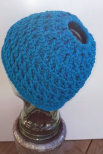 Crochet a Frenzy Bun Hat | The Crochet Crowd Messy Bun Crochet Hat Pattern Free With Hair Tie, Crochet Directions, Crochet Ponytail Hat Pattern, Bun Hat Crochet Pattern, Crochet Bun Hat, Messy Bun Hat Pattern, Crochet Pony, Ponytail Hat Crochet, Messy Bun Hat Crochet