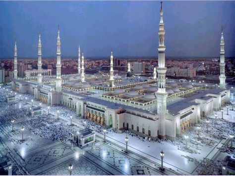 "Al-Masjid al-Nabawi (Arabic: المسجد النبوي [mæsdʒɪd ænnæbæwiː] "Mosque of the Prophet"), often called the Prophet's Mosque, is a mosque situated in the city of Medina. As the final resting place of the Islamic prophet Muhammad, it is considered the second holiest site in Islam by Muslims (the first being the Masjid al-Haram in Mecca) and is one of the largest mosques in the world. At Night, Building