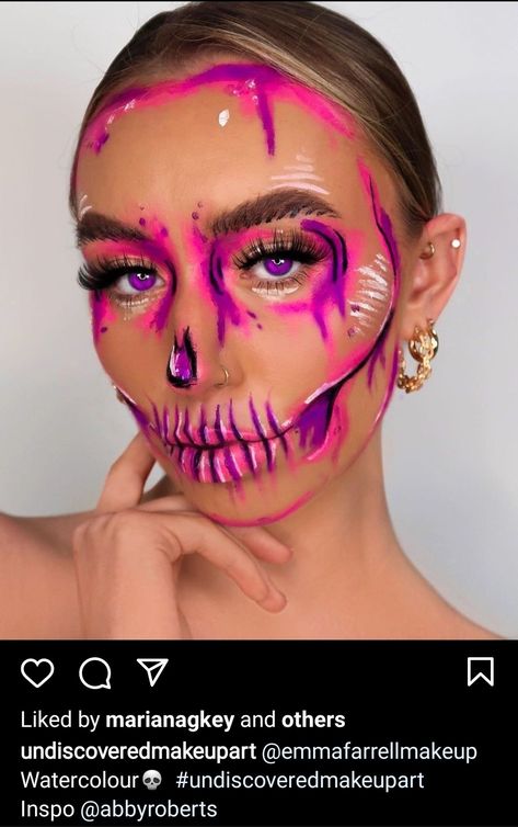 Pink and Purple Skull Makeup Look Candy Skeleton Makeup, Unicorn Skeleton Makeup, Pop Art Skull Makeup, Pink Sugar Skull Makeup, Skull Makeup Colorful, Pink Halloween Makeup Looks, Colorful Skeleton Makeup, Purple Skull Makeup, Pink Skeleton Makeup