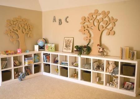 DIY toy storage for basement.   Paint the wall, floors, and ceiling. Place an in expensive area rug on the floor. Line the walls with the shelves. Put cut-out designs above shelves. Ready to play/recreate. Wooden Trees, Cubby Shelves, Window Bench, Basement Playroom, Toy Room, Playroom Storage, Toddler Rooms, Indoor Play, Toy Rooms