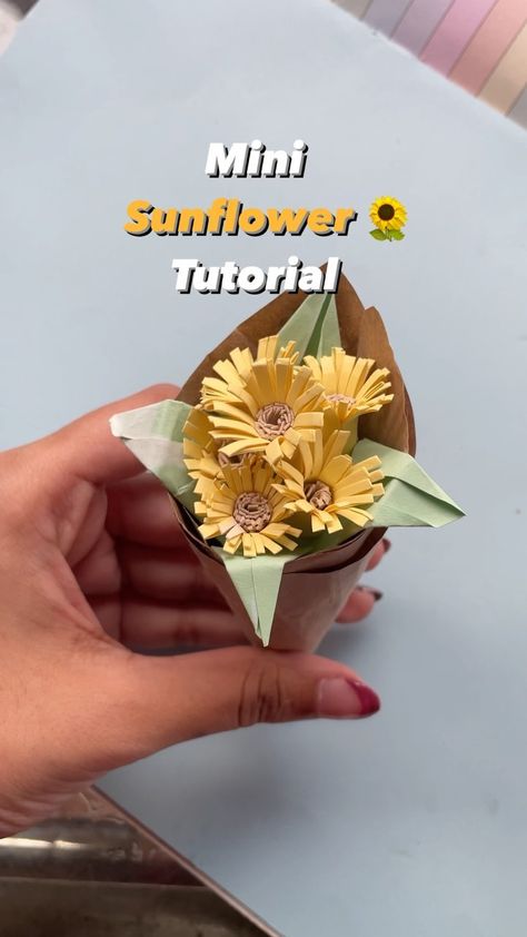 sherin - art/lifestyle on Instagram: "Detailed tutorial on mini paper sunflower! 👇🏻 Take a small rectangular paper Cut as shown in the video till mid way Do the same with…" Sunflower Paper Flowers, Sunflower Paper Craft, Paper Bouquet Diy, Paper Flower Bouquet Diy, Origami Flower Bouquet, Paper Flowers Diy Easy, Sunflower Crafts, Mini Sunflowers, Paper Sunflowers