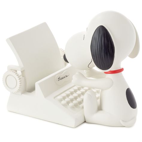 PRICES MAY VARY. Peanuts Snoopy resin cell phone holder features Snoopy at a typewriter. Black text on white typewriter reads: "Schulz" Perfect gift for bosses, coworkers, administrative assistants, teachers, parents, friends, classmates, writers or any fans of Snoopy. Phone holder measures approximately 3.25" W x 4.38" H x 6" D Snoopy Office Decor, Snoopy Items, Peanuts Birthday, Snoopy Gifts, Deep In Thought, Resin Figurine, Peanuts Christmas, Joe Cool, Tape Dispenser