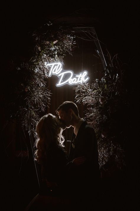 Kristen and Avery chose an abandoned mill to celebrate their moody wedding. Inspired by the movie Nightmare Before Christmas, this macabre couple used many elements to bring on the spooky vibes. From a bridal leather jacket, coffin ring boxes, and skeleton reception decorations, these two knocked the spooky vibe out of the park. Photos by Tennessee Wedding Photographer Erin Morrison Photography. www.erinmorrisonphotography.com Nightmare Before Christmas Wedding Theme, Moody Wedding Pictures, Bridal Leather Jacket, Christmas Wedding Themes, Nightmare Before Christmas Wedding, Moody Wedding Photography, Dark Wedding Theme, Coffin Ring, Goth Wedding