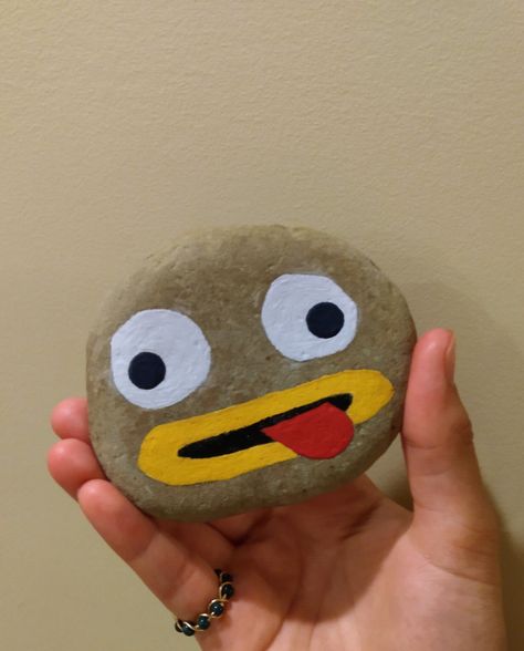 Here's a rock I painted to look like Greg's Rock from "Over the Garden Wall!" ❤️ I hope you like it!! #overthegardenwall#rock#paintedrock#art#cartoon#fall#craft#diyidea#cute Pumpkin Painting Over The Garden Wall, Over The Garden Wall Party Decor, Over The Garden Wall Rock, Over The Garden Wall Pumpkin Painting, Over The Garden Wall Halloween Decor, Otgw Party, Over The Garden Wall Greg, Stone Art Painting, Halloween Crafts Decorations