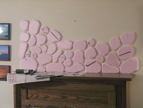 Give your Fireplace an update with this faux stone idea on a budget. Made with Styrofoam, spackling and paint this simple idea makes a big difference to your living room decor. Cheap Fireplace Makeover, Diy Stone Wall, Faux Brick Backsplash, Above The Fireplace, Faux Fireplace Mantels, Faux Stone Walls, Brick Accent Walls, Faux Brick Panels, Stone Diy